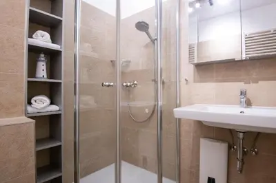 Ein Badezimmer in der Unterkunft Haus Pegasus App 1
