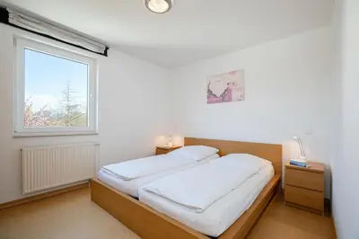 Ein Bett oder Betten in einem Zimmer der Unterkunft Wohnung 4- Paulsen