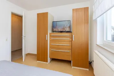 Ein Bett oder Betten in einem Zimmer der Unterkunft Wohnung 4- Paulsen