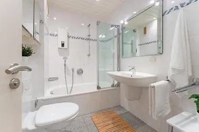 Ein Badezimmer in der Unterkunft Hansa 3 Piontek Strandblick
