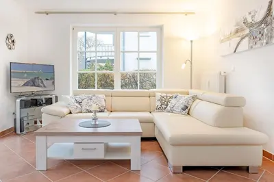 Ein Sitzbereich in der Unterkunft Appartement Meerzeit- Residenz Kurparkhöhe