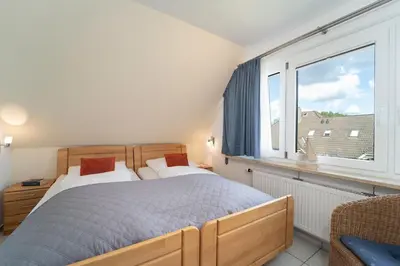 Ein Bett oder Betten in einem Zimmer der Unterkunft Badeweg 4 Strandläufer 2