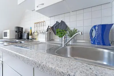 Küche/Küchenzeile in der Unterkunft Fahrenkrug Südwind