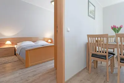 Ein Bett oder Betten in einem Zimmer der Unterkunft Fahrenkrug Südwind