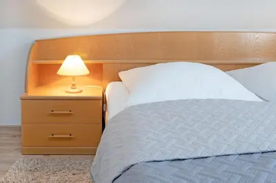 Ein Bett oder Betten in einem Zimmer der Unterkunft Fahrenkrug Südwind