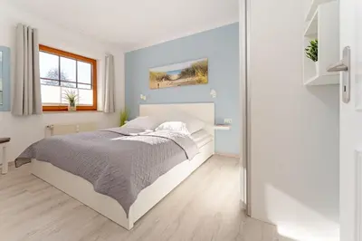 Ein Bett oder Betten in einem Zimmer der Unterkunft Landhaus Pönitz am See Wohnung 7