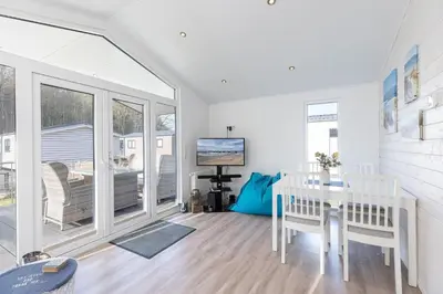 TV/Unterhaltungsangebot in der Unterkunft Ferienhäuser Lübecker Bucht Ferienhaus Beachcomber