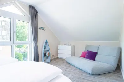 Ein Bett oder Betten in einem Zimmer der Unterkunft Strandnah