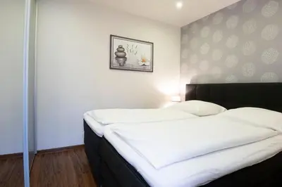 Ein Bett oder Betten in einem Zimmer der Unterkunft Erste Reihe