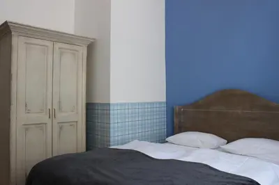 Ein Bett oder Betten in einem Zimmer der Unterkunft Lieblingsplatz Hotel Strandperle