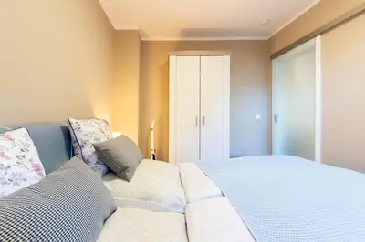 Ein Bett oder Betten in einem Zimmer der Unterkunft Strandliebe