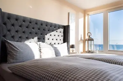 Ein Bett oder Betten in einem Zimmer der Unterkunft Ferienwohnung Aalkate App 3