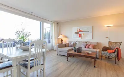 Ein Sitzbereich in der Unterkunft Ferienwohnung Meeresleuchten