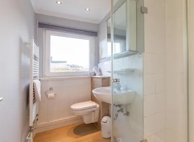 Ein Badezimmer in der Unterkunft Ferienhaus Kleeblatt 5 - Zentrale, ruhige Lage mit Garten und Terrasse
