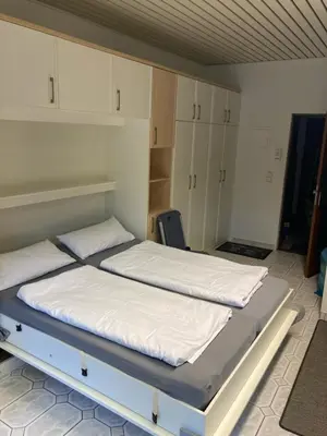 Ein Bett oder Betten in einem Zimmer der Unterkunft Urlaub am Strand 2