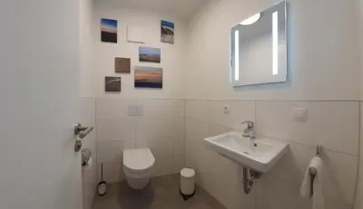 Ein Badezimmer in der Unterkunft Neue Liebe Haffkrug 1