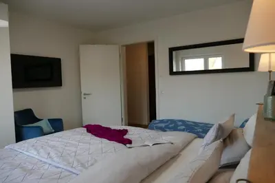 Ein Bett oder Betten in einem Zimmer der Unterkunft Neue Liebe Haffkrug 1