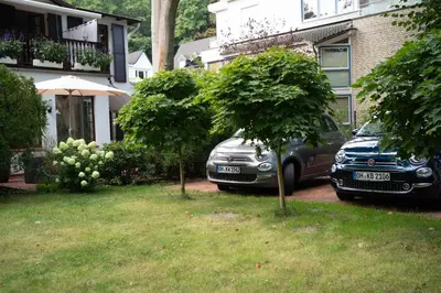 Ein Garten an der Unterkunft Studio-Apartment Piccolino 26, Timmendorfer Strand- Strandkorb inklusive & privaten Zugang zur Ostsee