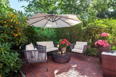 Ein Garten an der Unterkunft Studio-Apartment Piccolino 26, Timmendorfer Strand- Strandkorb inklusive & privaten Zugang zur Ostsee