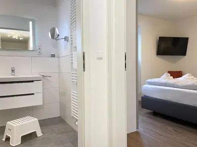 Ein Bett oder Betten in einem Zimmer der Unterkunft Neue Liebe Haffkrug 2