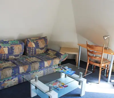 Ein Sitzbereich in der Unterkunft Hotel Wakenitzblick