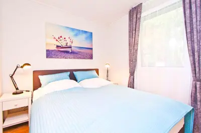 Ein Bett oder Betten in einem Zimmer der Unterkunft Gronenberger Mühle Haus 14