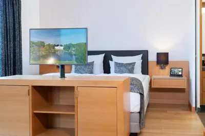 Ein Bett oder Betten in einem Zimmer der Unterkunft Schlossgut Gross Schwansee