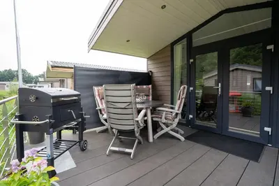Ein Balkon oder eine Terrasse in der Unterkunft Casa del Mar Scharbeutz - Sauna kostenlos - 1 kleiner Hund willkommen - umzäunter Garten