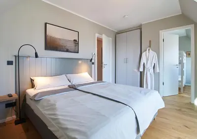 Ein Bett oder Betten in einem Zimmer der Unterkunft Julie´s Home (Penthouse)