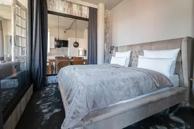 Ein Bett oder Betten in einem Zimmer der Unterkunft Port of Travemünde, Opening 2021