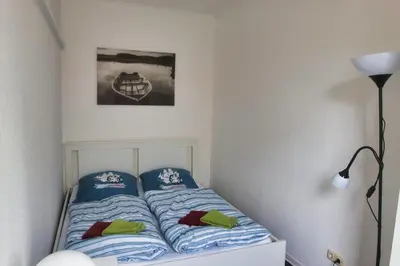 Ein Bett oder Betten in einem Zimmer der Unterkunft Alte Segelschule