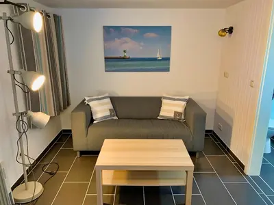Ein Sitzbereich in der Unterkunft Segellast 5