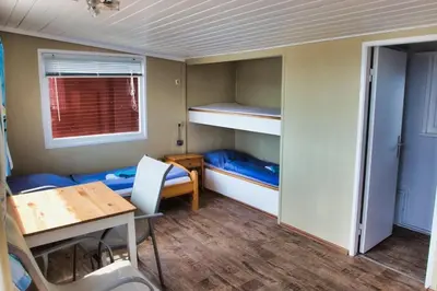 Ein Bett oder Betten in einem Zimmer der Unterkunft Finnenhaus 1