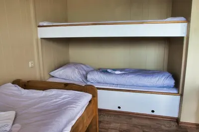 Ein Bett oder Betten in einem Zimmer der Unterkunft Finnenhaus 2