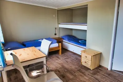 Ein Bett oder Betten in einem Zimmer der Unterkunft Finnenhaus 4
