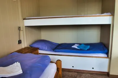 Ein Bett oder Betten in einem Zimmer der Unterkunft Finnenhaus 4