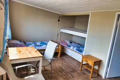 Ein Bett oder Betten in einem Zimmer der Unterkunft Finnenhaus 5