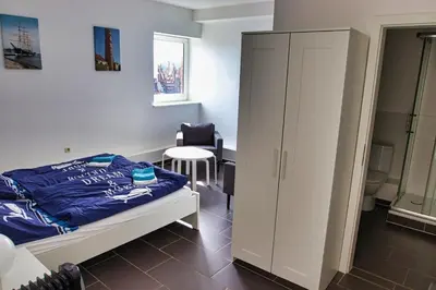 Ein Bett oder Betten in einem Zimmer der Unterkunft Segellast 2