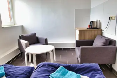 Ein Sitzbereich in der Unterkunft Segellast 2