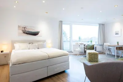 Ein Bett oder Betten in einem Zimmer der Unterkunft Luv 54 Grad Nord