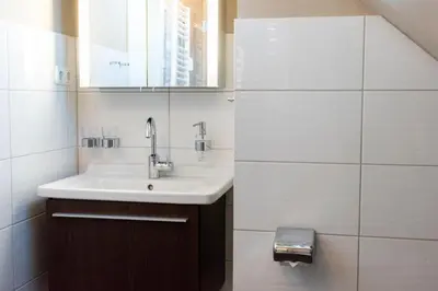 Ein Badezimmer in der Unterkunft Ferienwohnung Strandburg 25