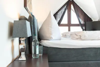 Ein Bett oder Betten in einem Zimmer der Unterkunft Ferienwohnung Strandburg 25