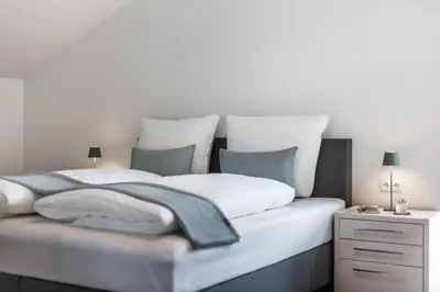 Ein Bett oder Betten in einem Zimmer der Unterkunft Casa Báltica Haffkrug