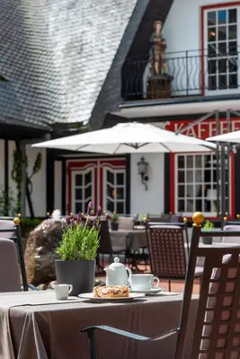 Ein Restaurant oder anderes Speiselokal in der Unterkunft Landhaus Carstens