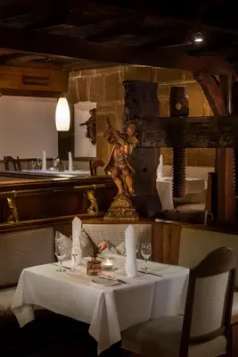 Ein Restaurant oder anderes Speiselokal in der Unterkunft Landhaus Carstens