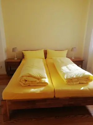 Ein Bett oder Betten in einem Zimmer der Unterkunft Doris` Hus
