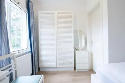 Ein Bett oder Betten in einem Zimmer der Unterkunft Ferienhaus am Strandwäldchen