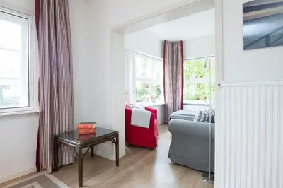 Ein Sitzbereich in der Unterkunft Ferienhaus am Strandwäldchen