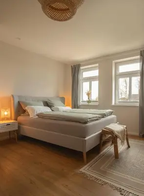 Ein Bett oder Betten in einem Zimmer der Unterkunft Haus 1