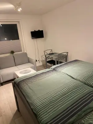 Ein Bett oder Betten in einem Zimmer der Unterkunft Ferienwohnungen Dummersdorfer Straße